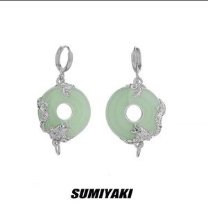 Oriental jade detailed earrings